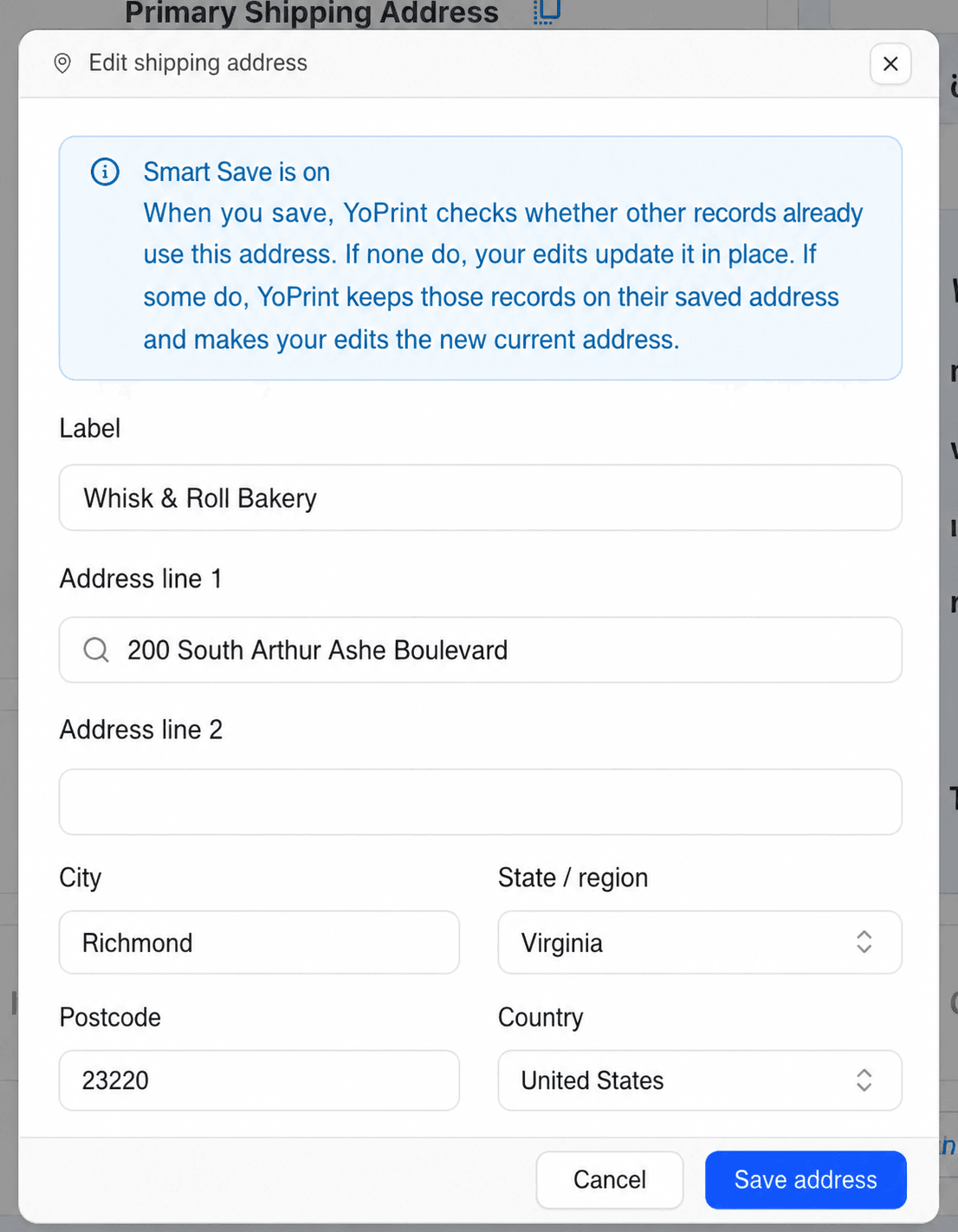 YoPrint Smart Save message in an Edit shipping address dialog explaining that YoPrint checks whether other records already use the address before deciding whether to update it in place or keep older records on their saved address.
